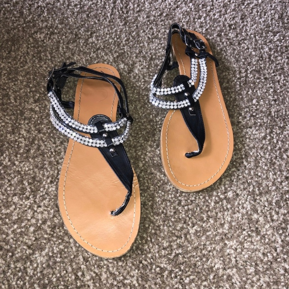 black buckle sandals